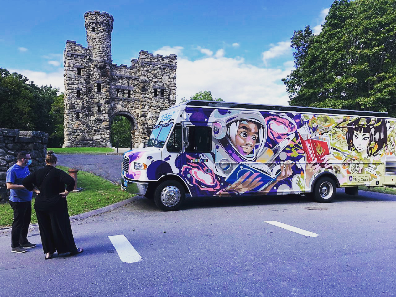 Libby Bookmobile in front of Bancroft Tower, points to Libby Schedule.