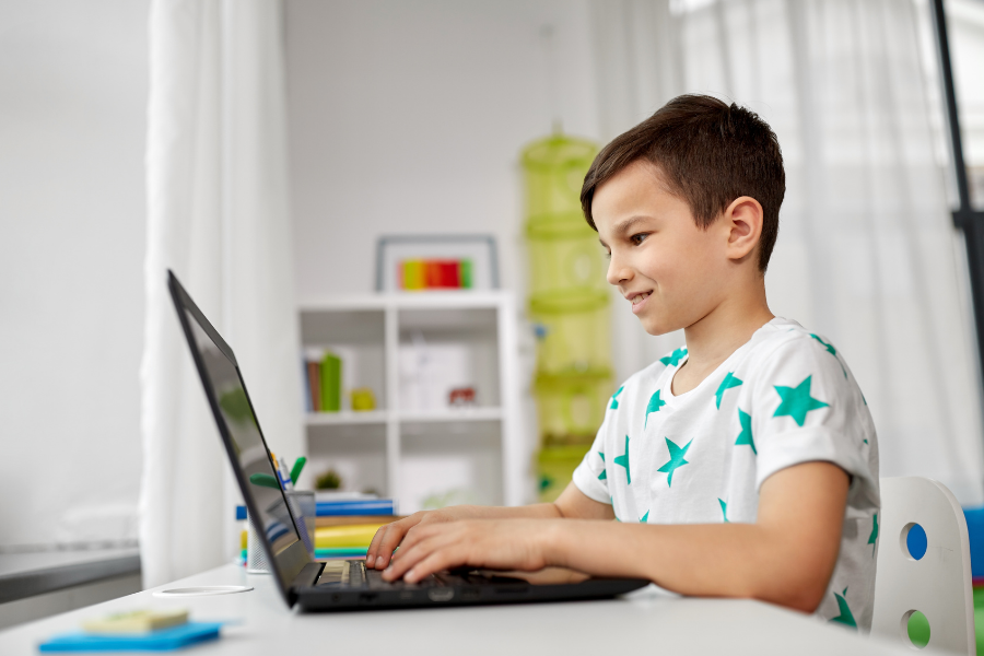 Kid getting online tutoring help.